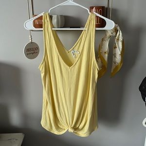 yellow tank top